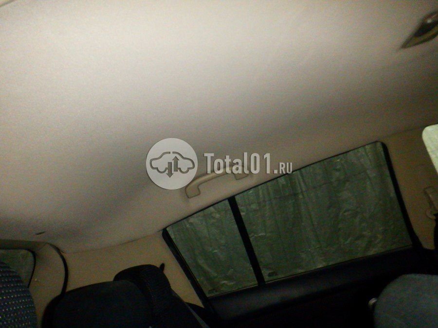 Фото Nissan Tiida 54