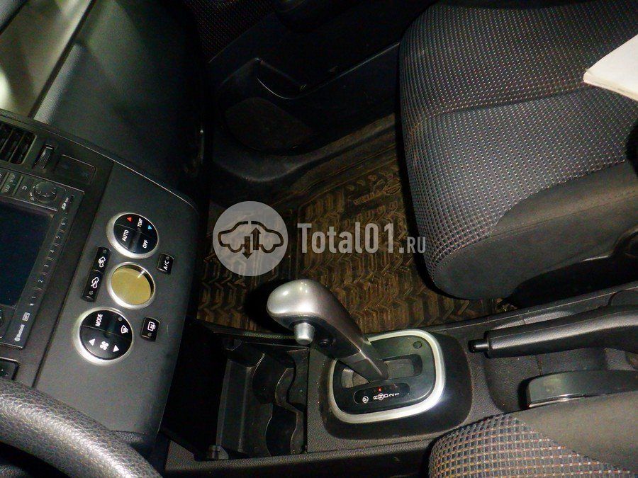Фото Nissan Tiida 100