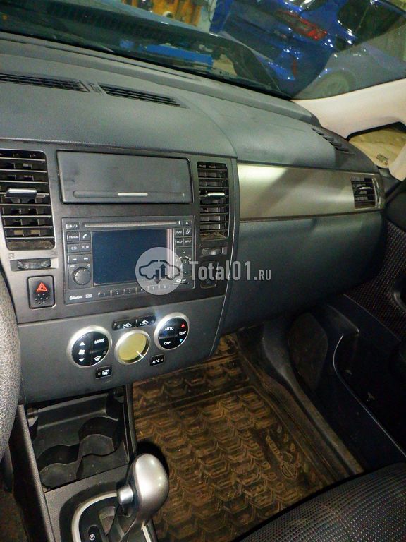 Фото Nissan Tiida 106