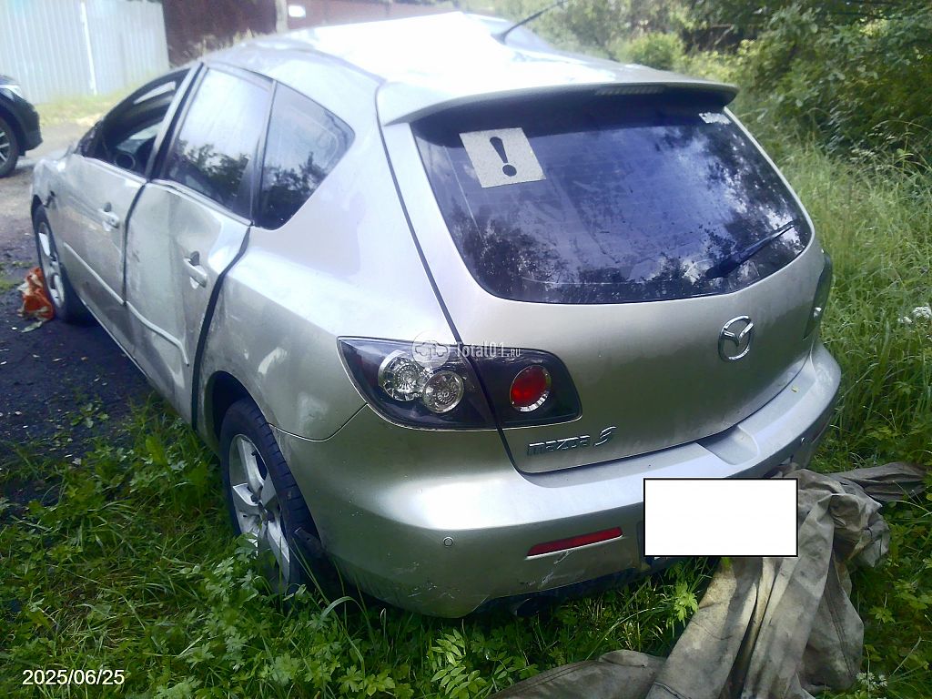 Фото Mazda 3 6