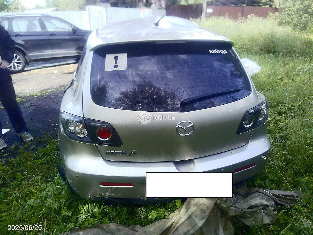 Фото Mazda 3 8