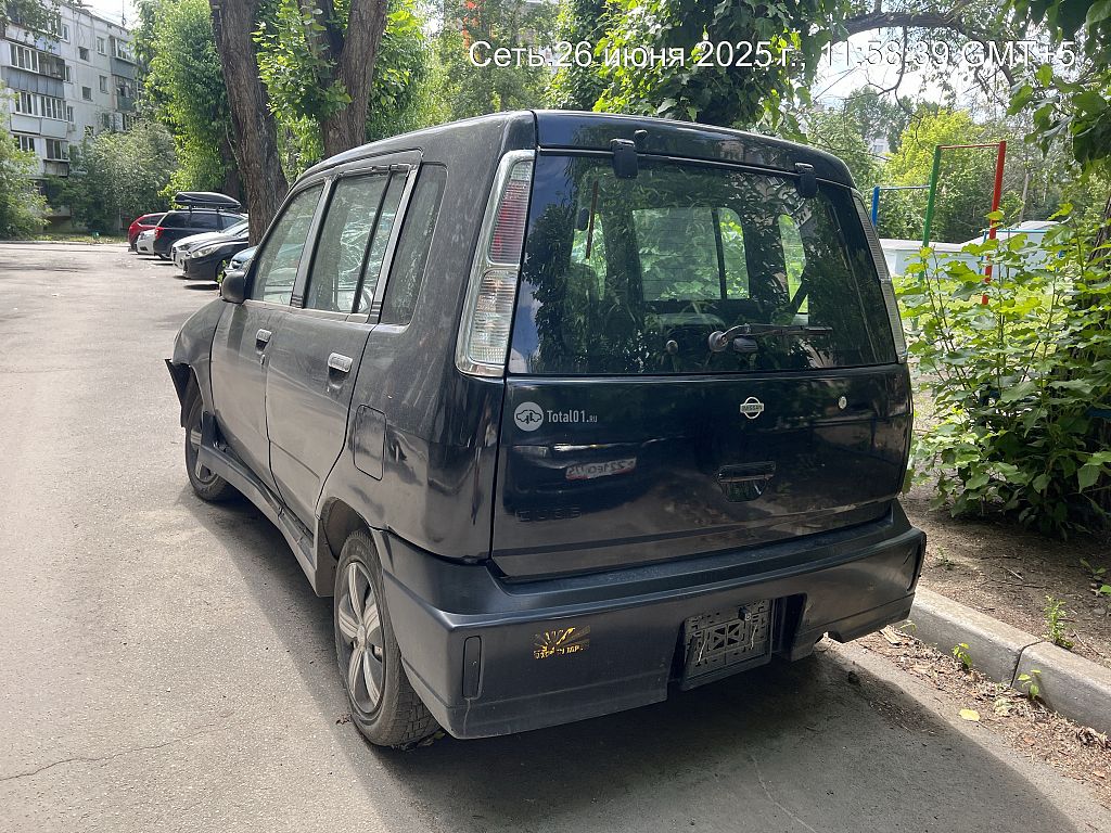 Фото Nissan Cube 6