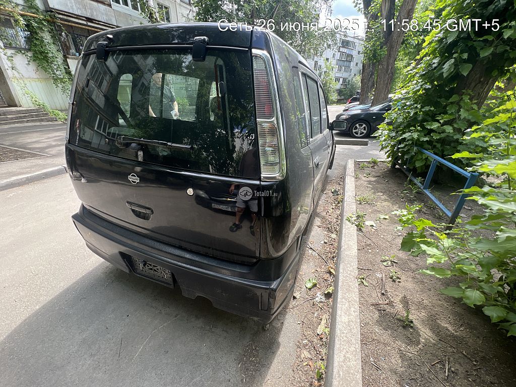 Фото Nissan Cube 8