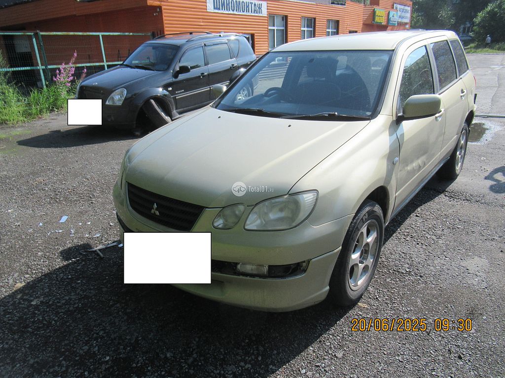Фото Mitsubishi Airtrek 8