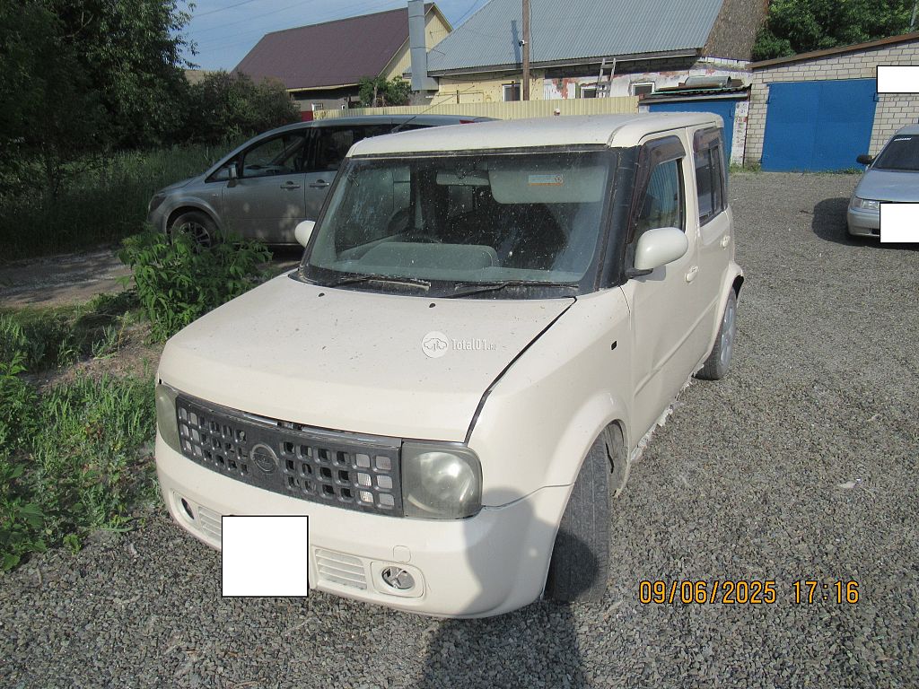 Фото Nissan Cube 58