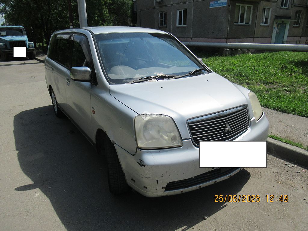 Фото Mitsubishi Dion 6