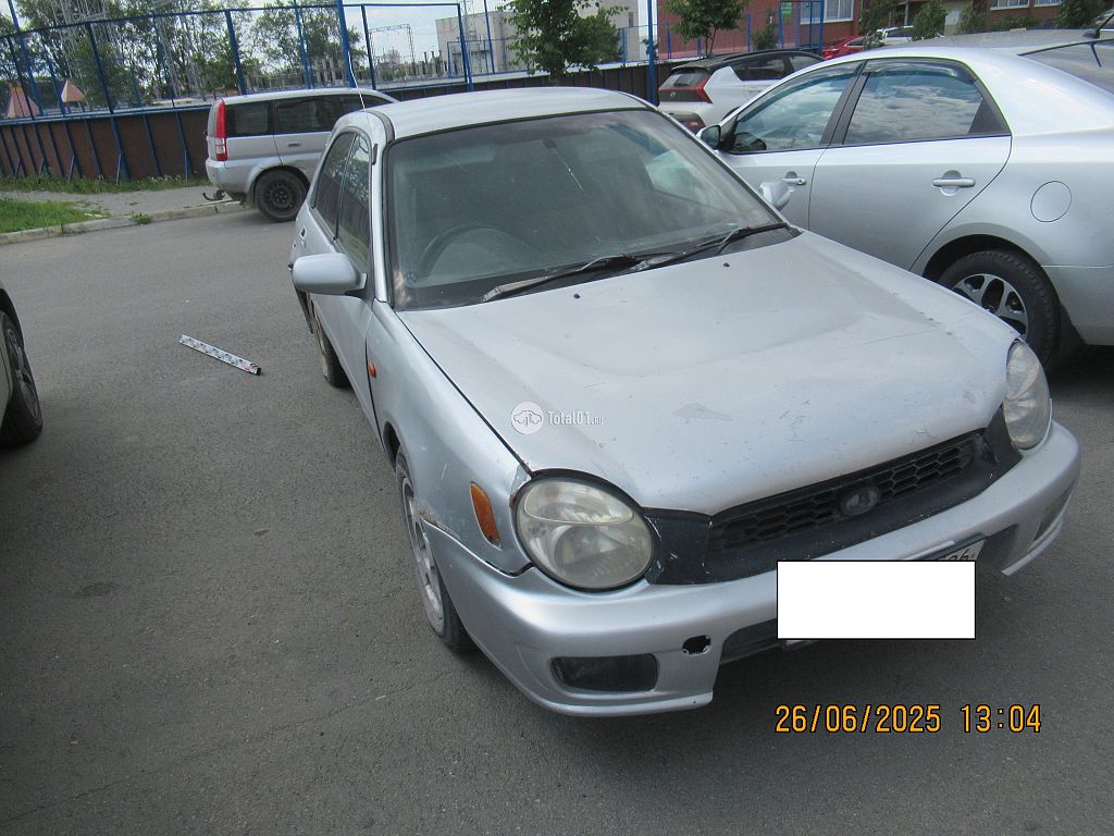 Фото Subaru Impreza 12