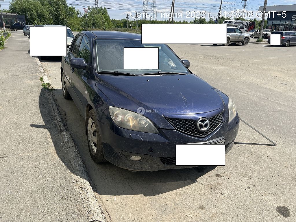 Фото Mazda 3 8
