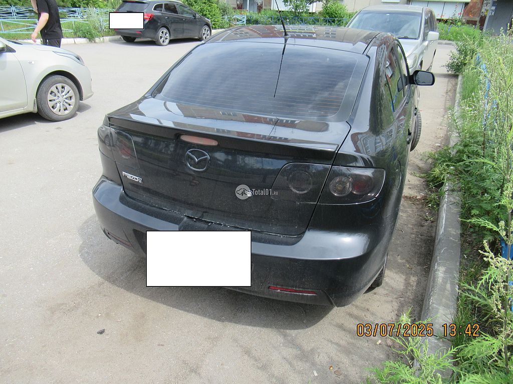 Фото Mazda 3 8