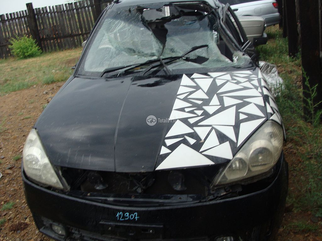 Фото Nissan Wingroad 4