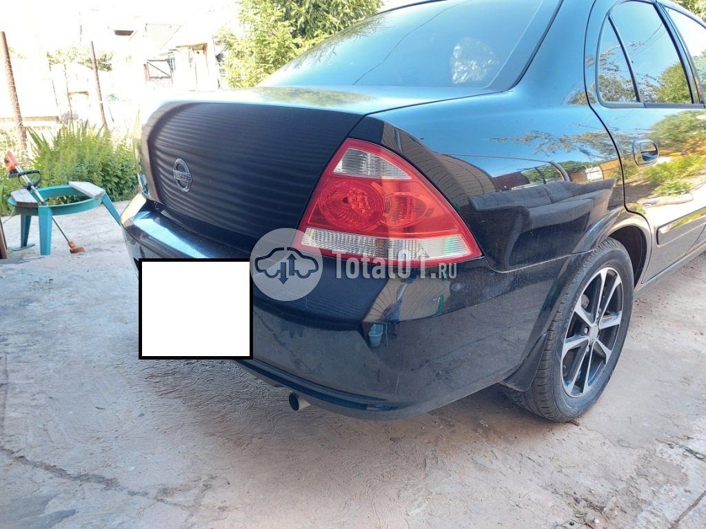 Фото Nissan Almera Classic 8