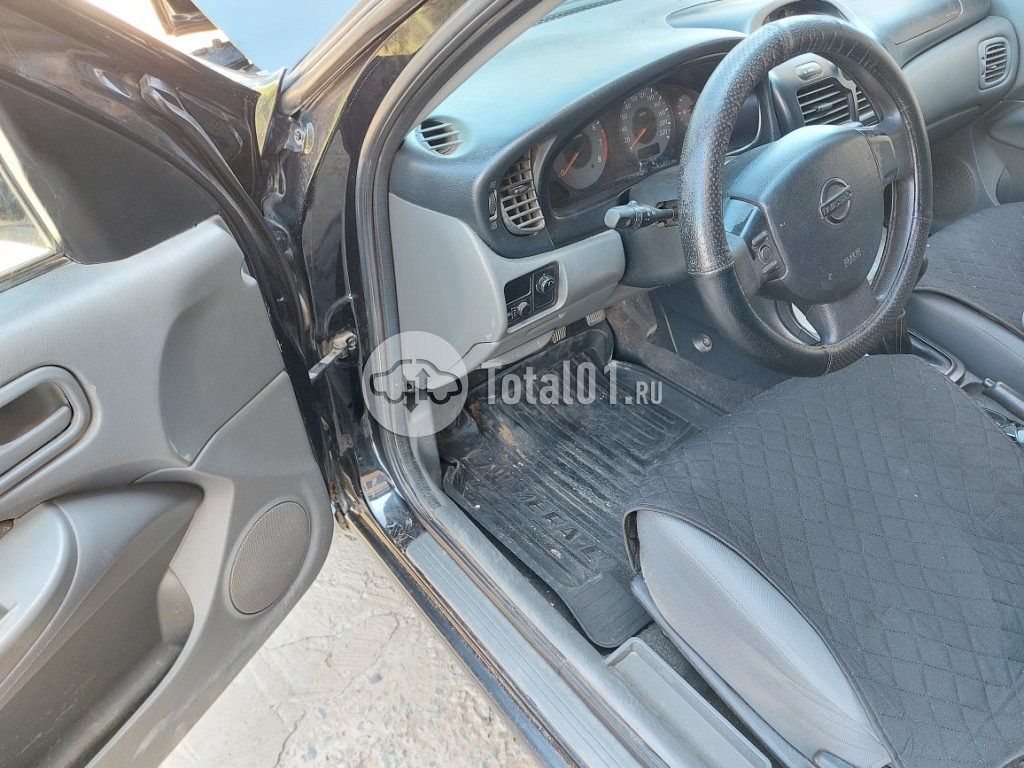 Фото Nissan Almera Classic 18