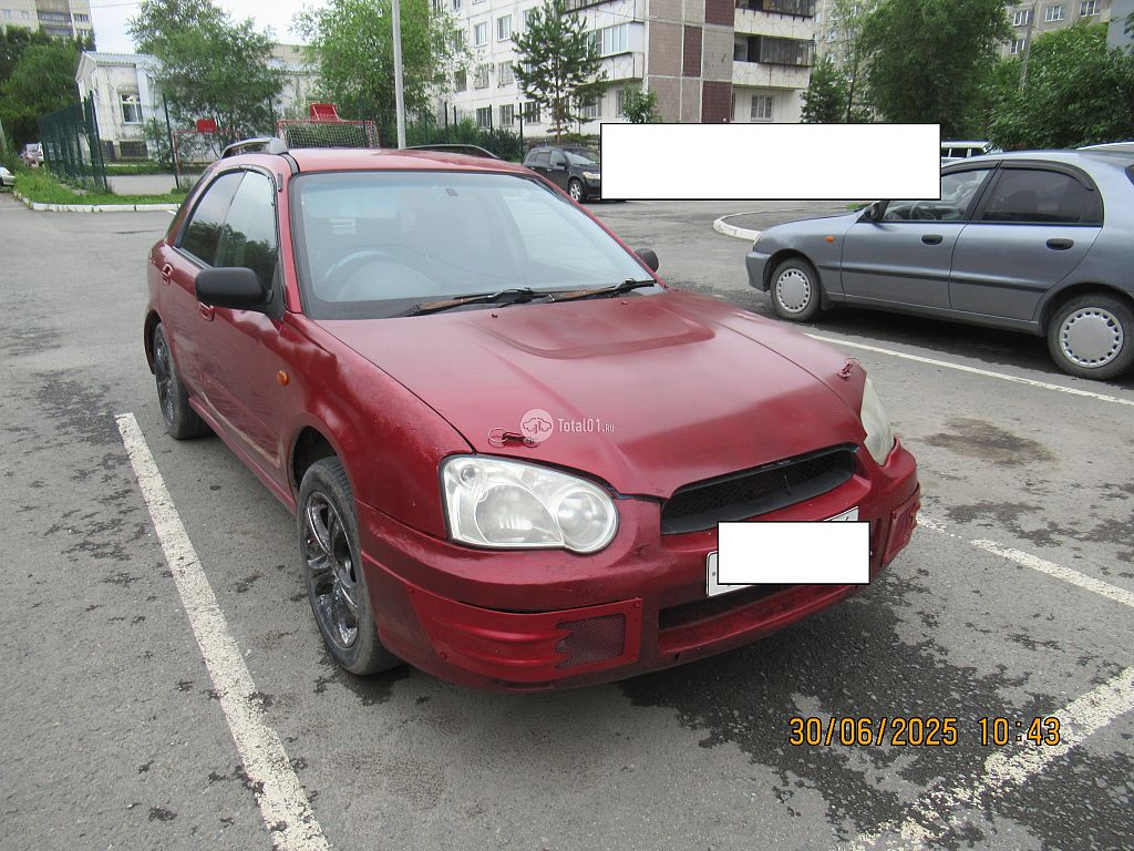Фото Subaru Impreza 8