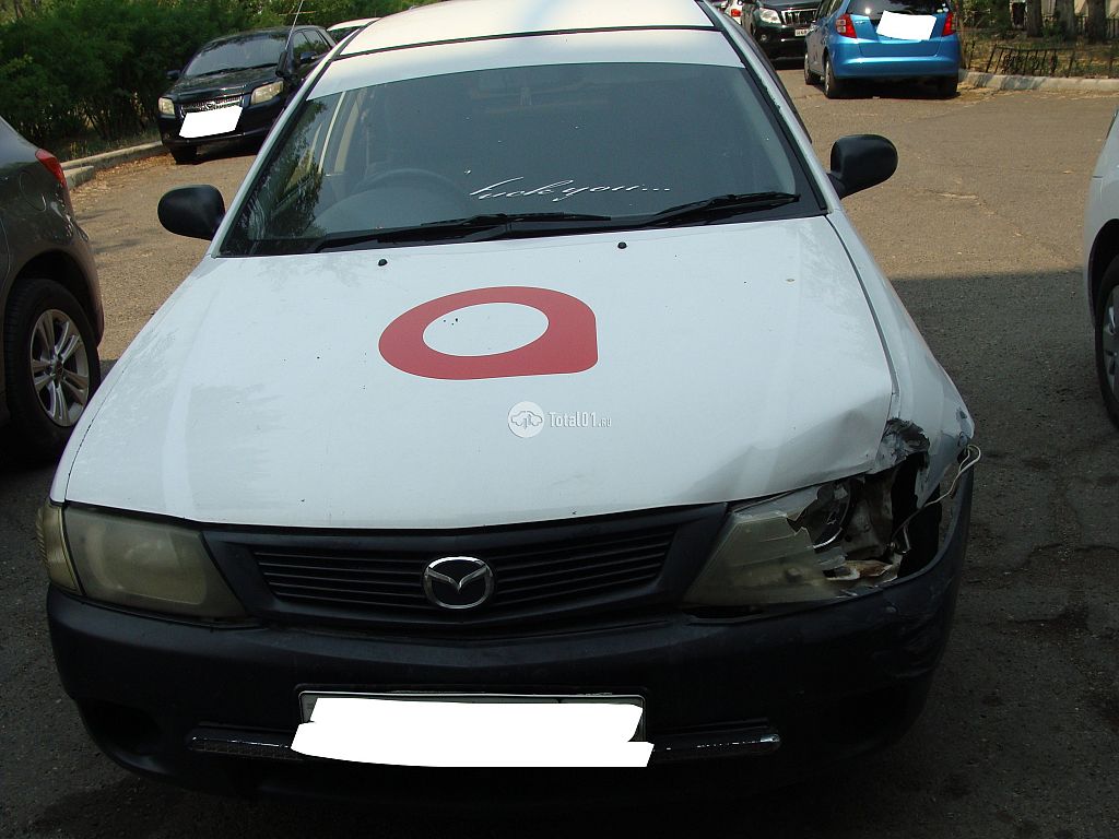 Фото Mazda 323 2