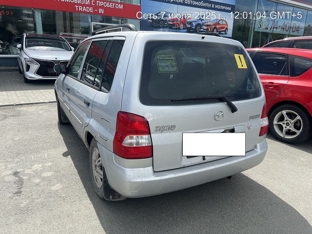 Фото Mazda Demio 4