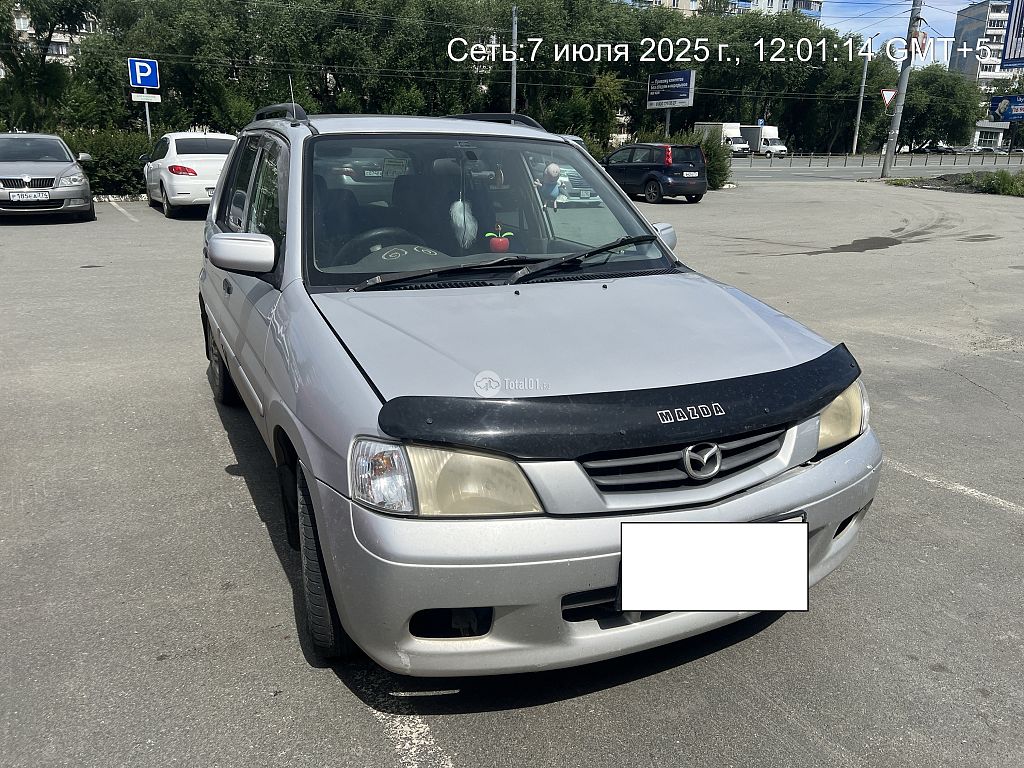Фото Mazda Demio 8