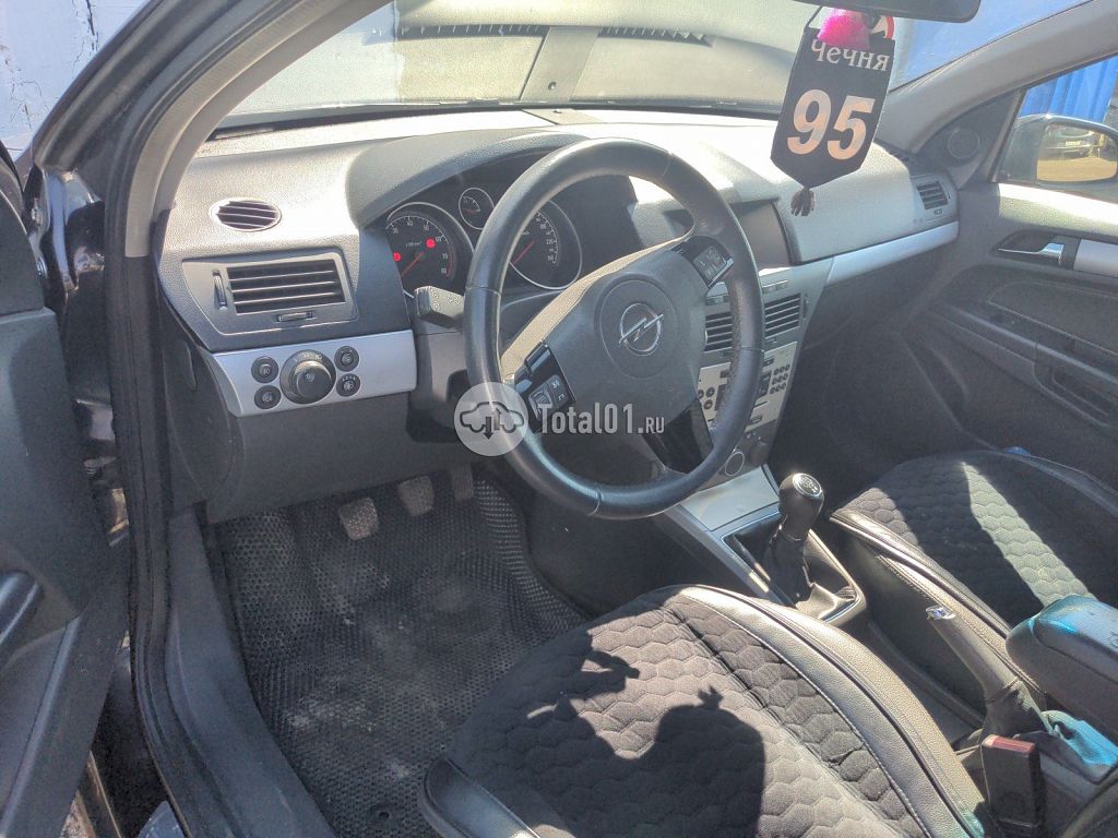 Фото Opel Astra 30
