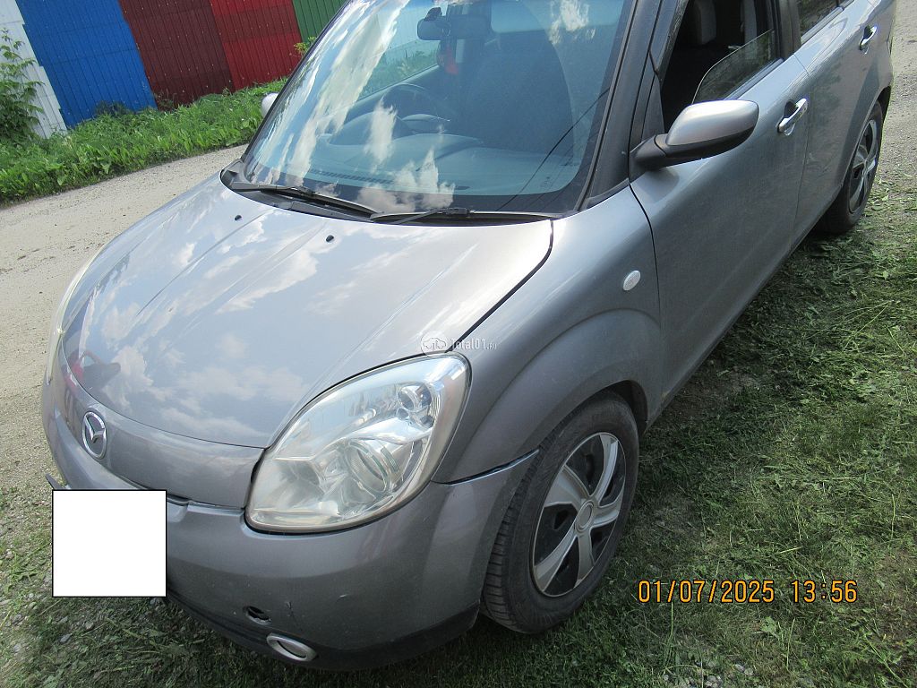 Фото Mazda Verisa 4
