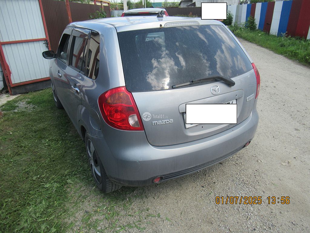 Фото Mazda Verisa 6