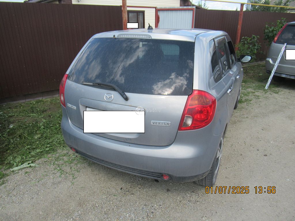 Фото Mazda Verisa 8