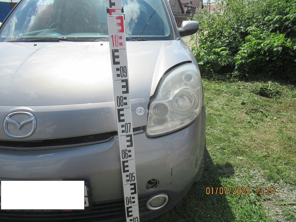 Фото Mazda Verisa 14