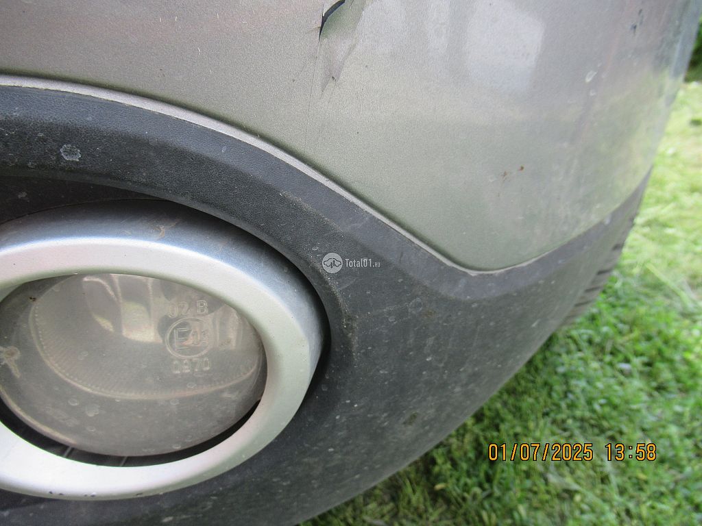 Фото Mazda Verisa 32