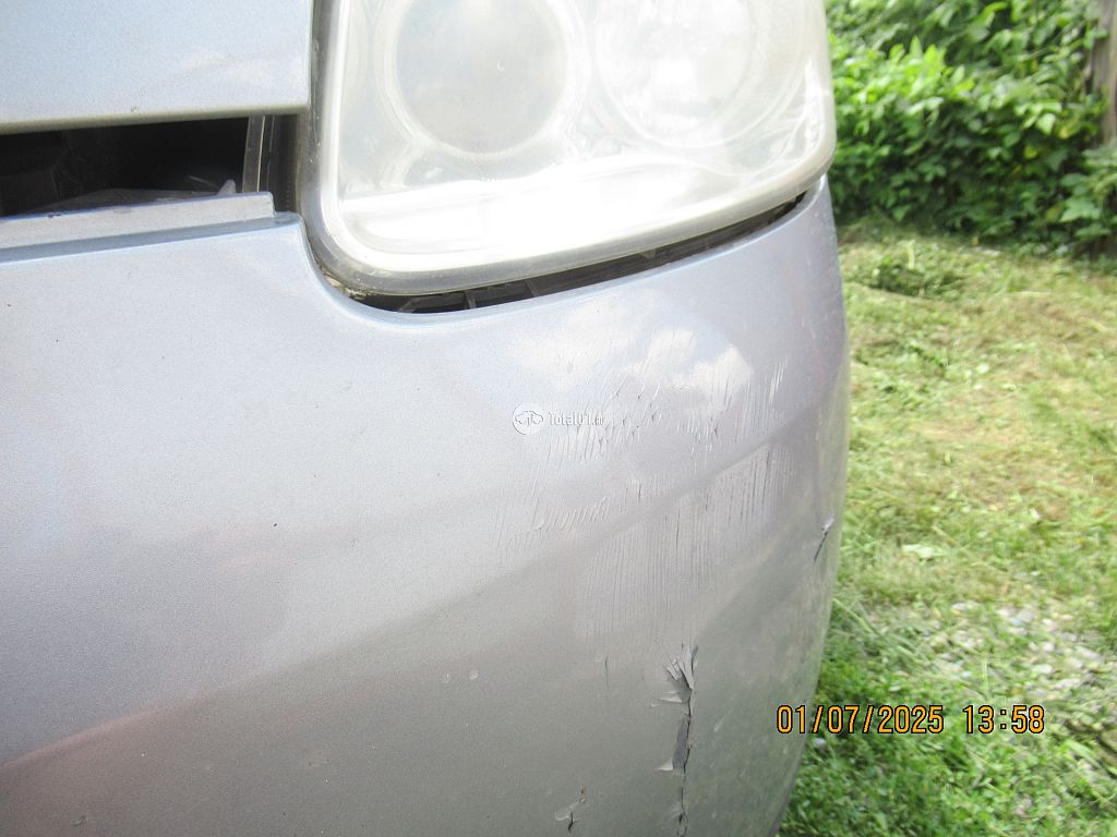 Фото Mazda Verisa 36