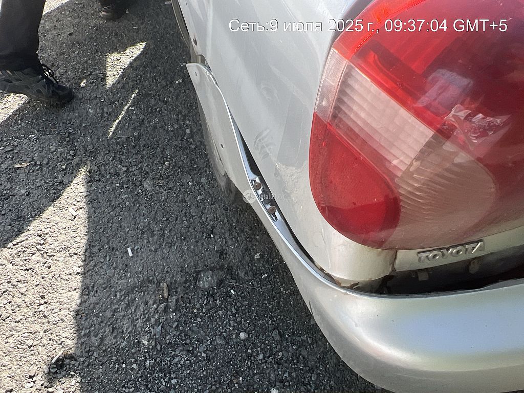 Фото Toyota Echo 90