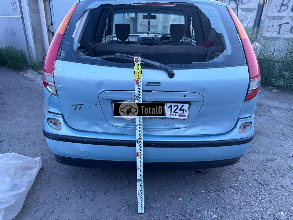 Фото Nissan Tino 6