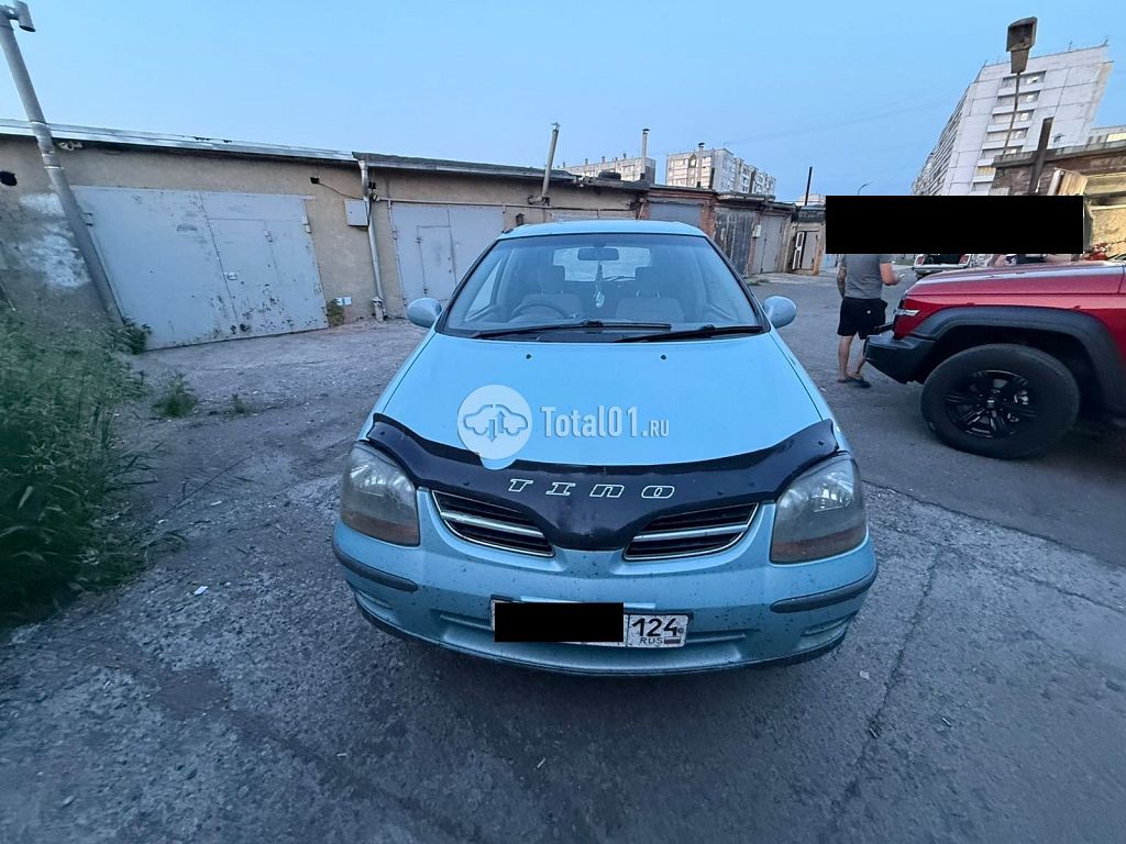 Фото Nissan Tino 44