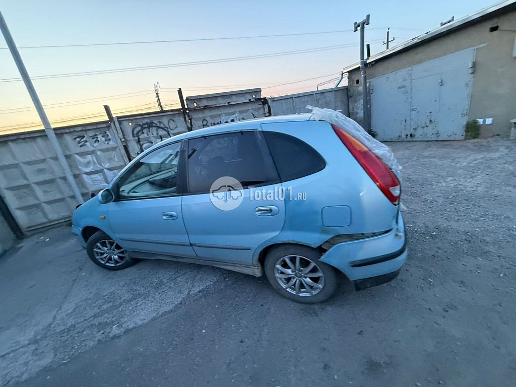Фото Nissan Tino 46