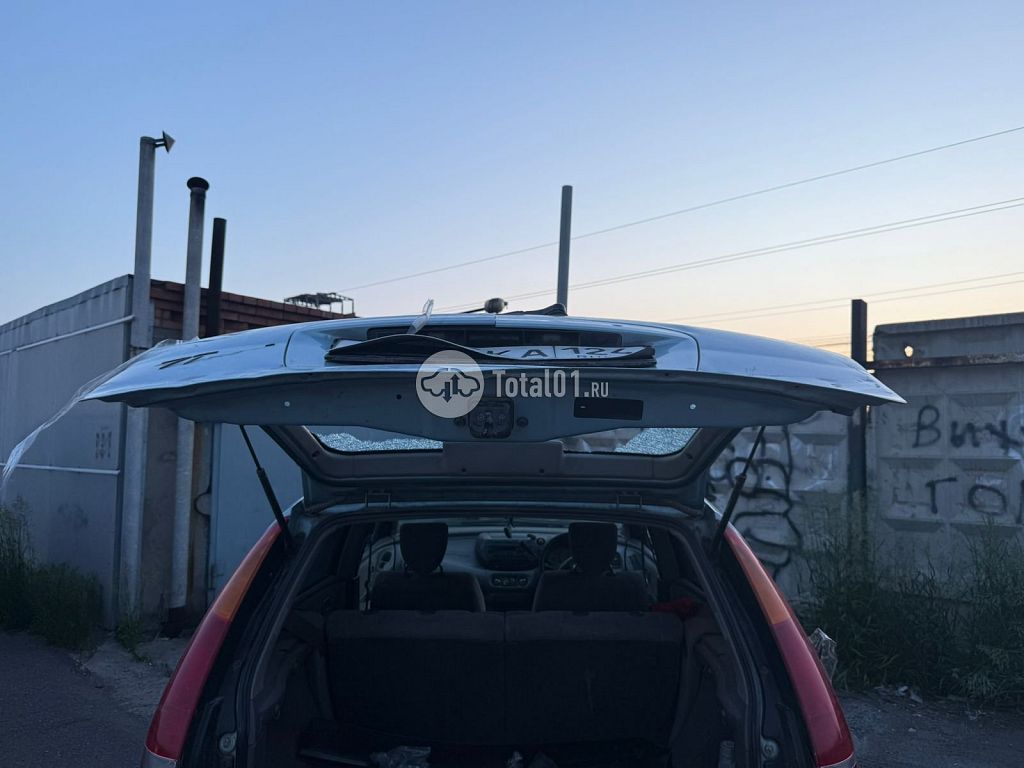 Фото Nissan Tino 54