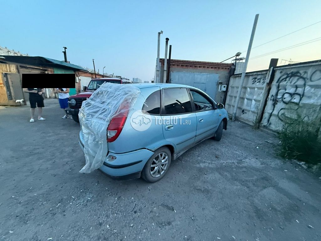Фото Nissan Tino 56