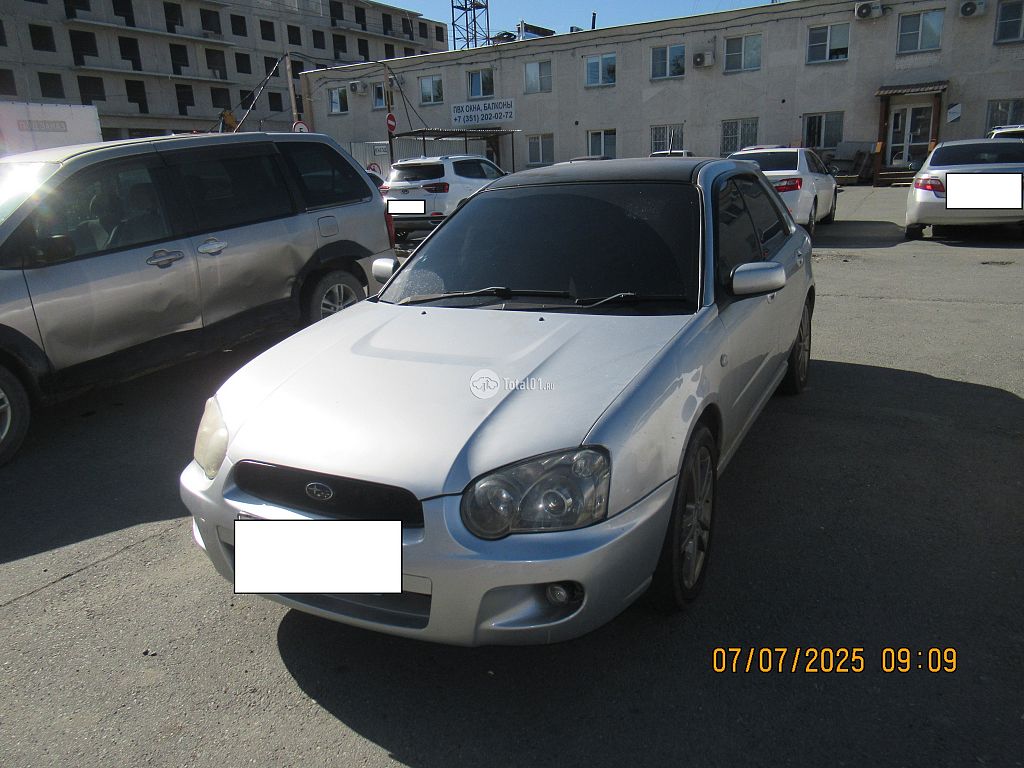 Фото Subaru Impreza 4
