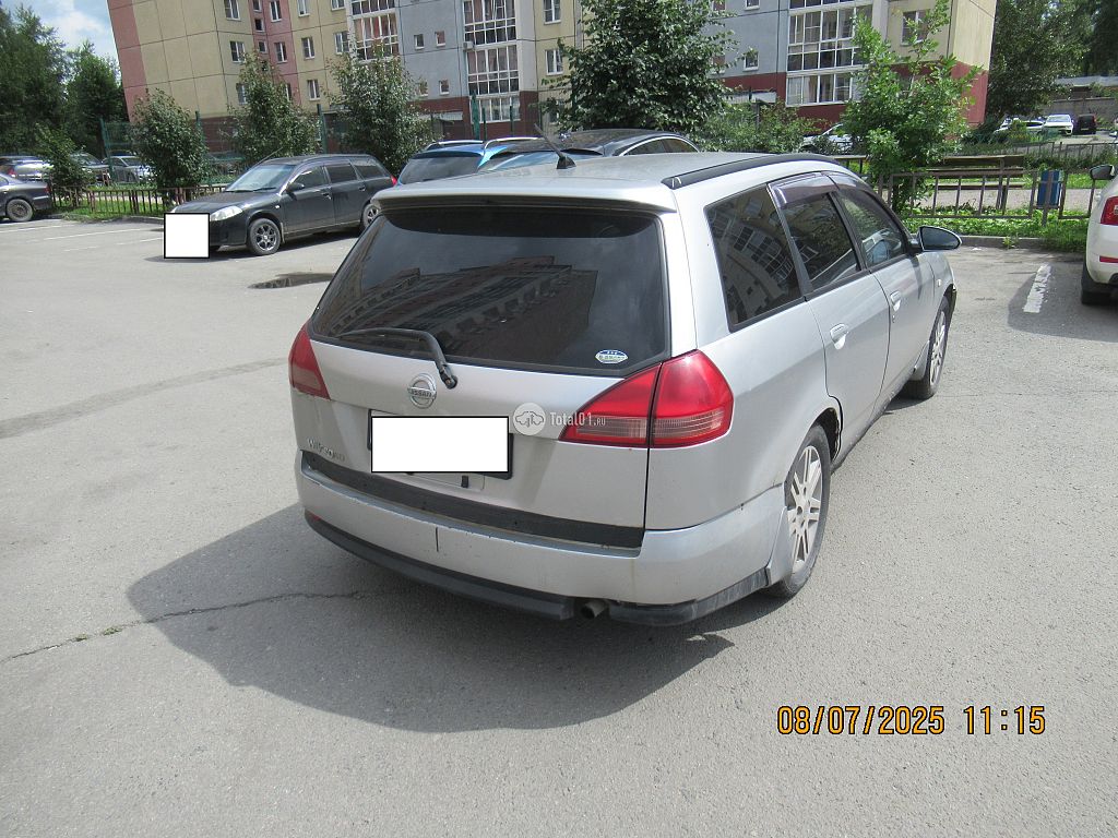 Фото Nissan Wingroad 2