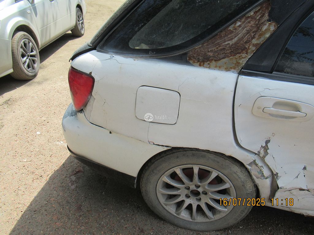 Фото Subaru Impreza 16