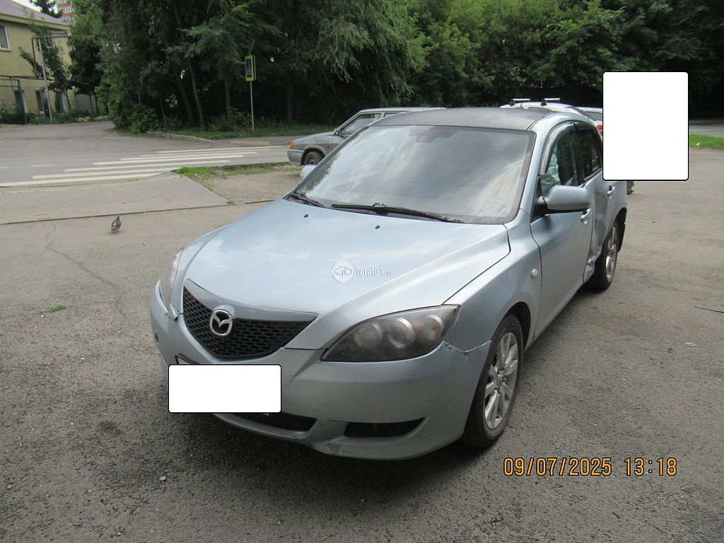 Фото Mazda 3 10