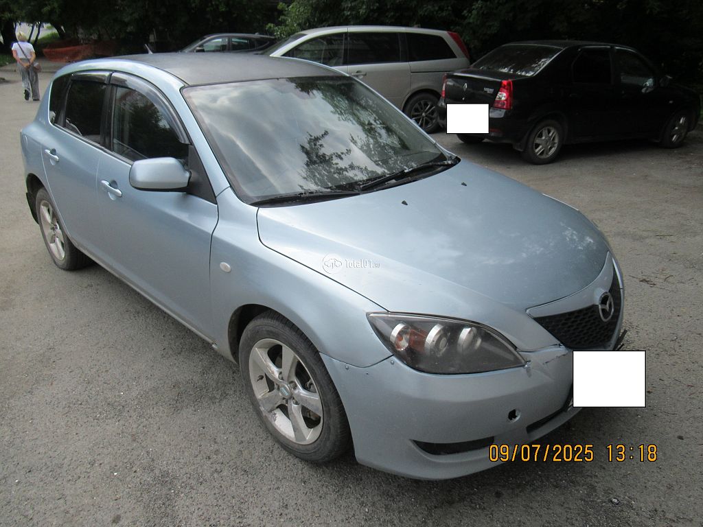 Фото Mazda 3 12