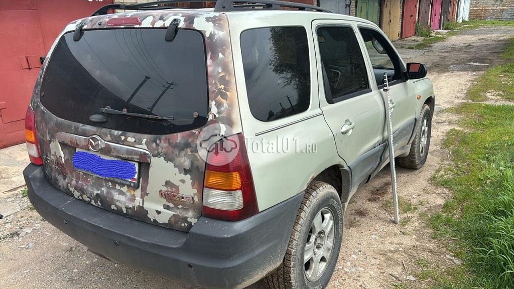 Фото Mazda Tribute 8