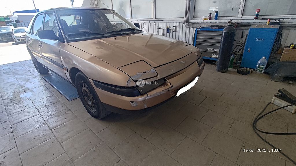 Фото Mazda 323 2