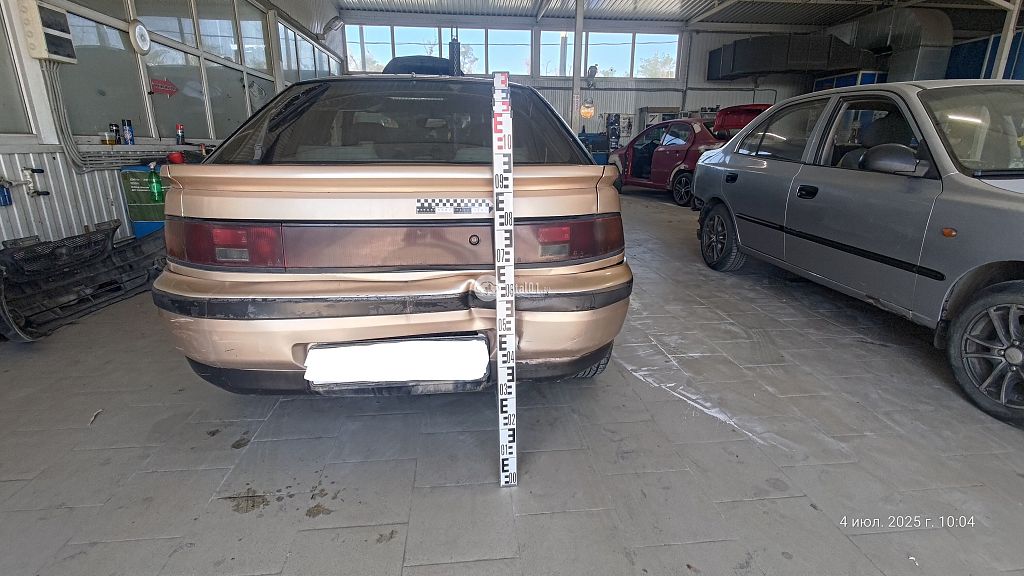 Фото Mazda 323 8