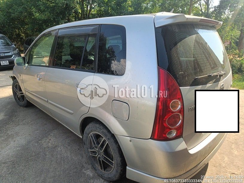 Фото Mazda Premacy 10