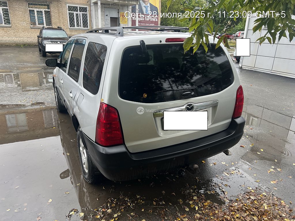 Фото Mazda Tribute 8