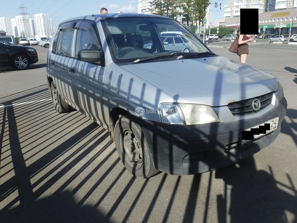 Фото Mazda Demio 4
