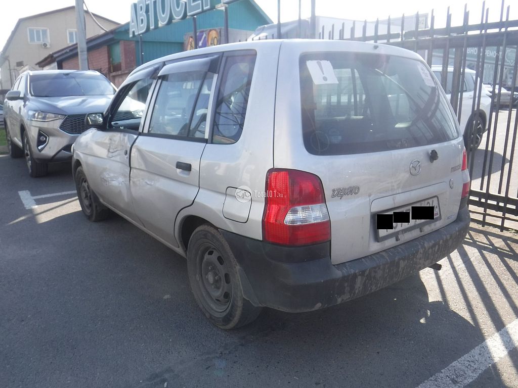 Фото Mazda Demio 8