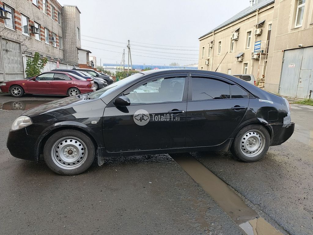 Фото Nissan Primera 10