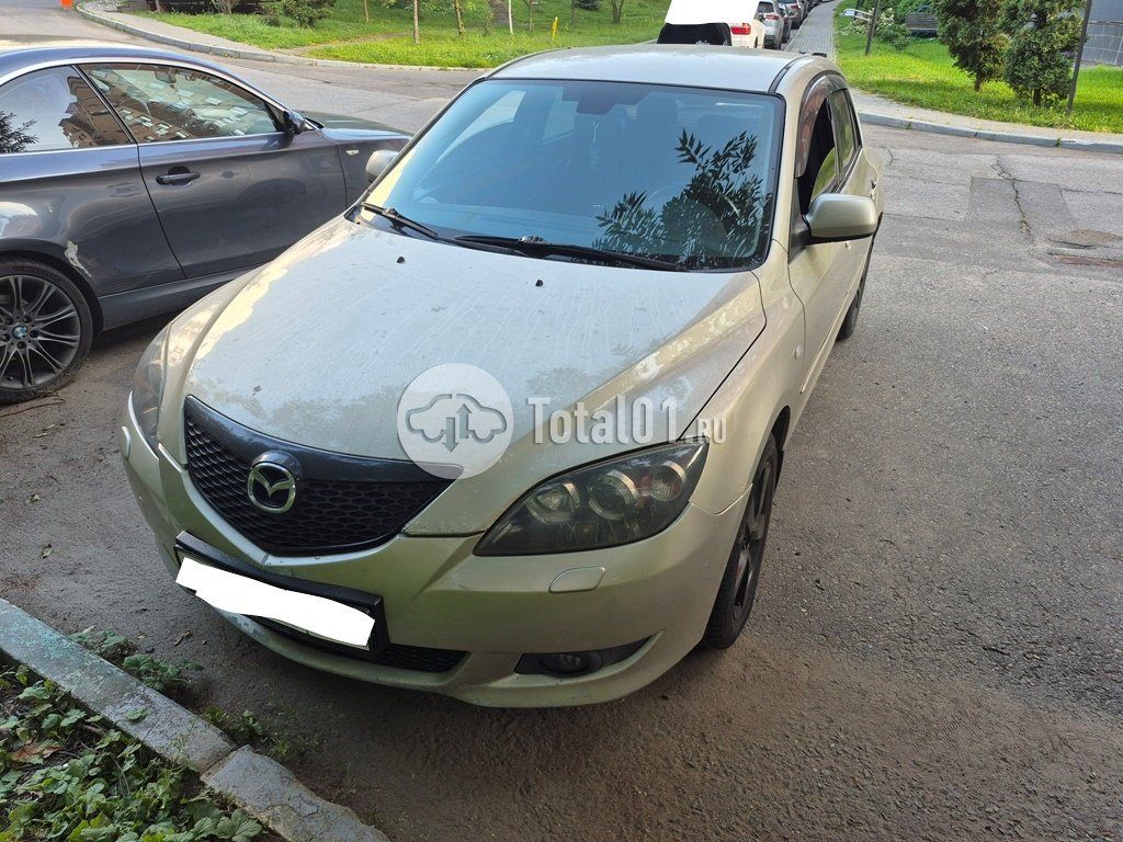 Фото Mazda 3 4
