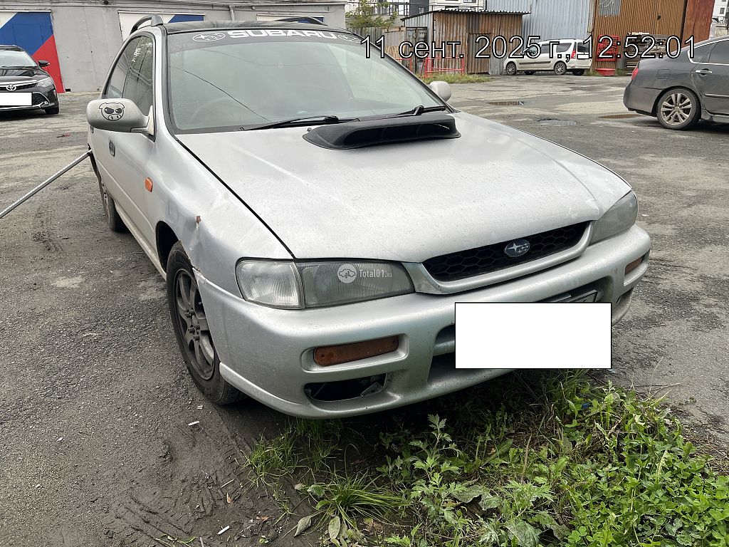 Фото Subaru Impreza 6