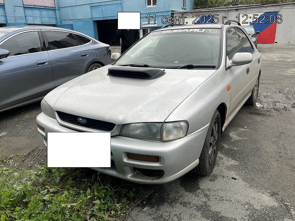 Фото Subaru Impreza 8