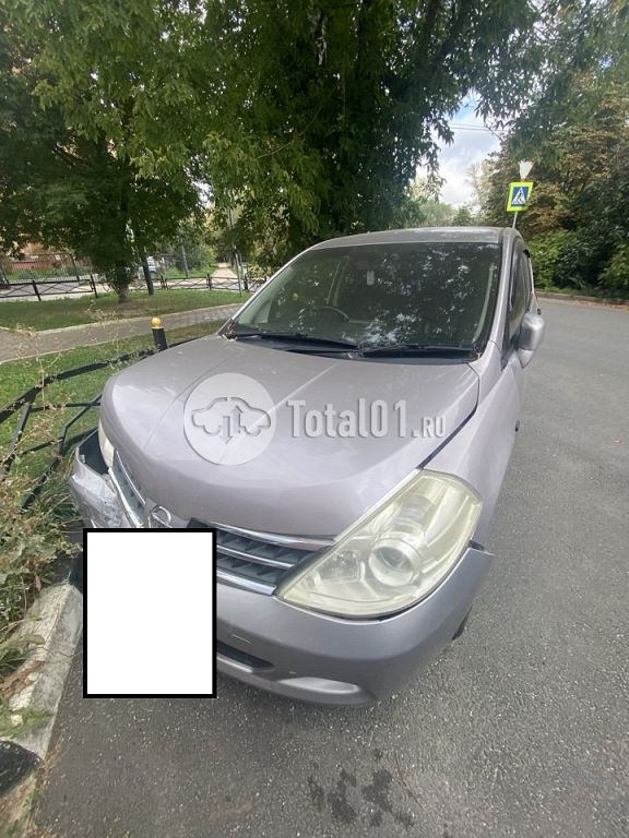 Фото Nissan Tiida 20